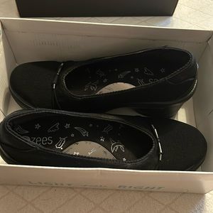Woman’s slip on shoes with chunky heel.